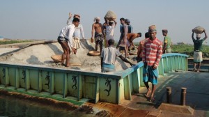 Heavy Lifting: Unloading the Sand Boats